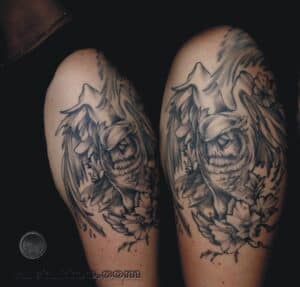 tatuaż męski na ramieniu